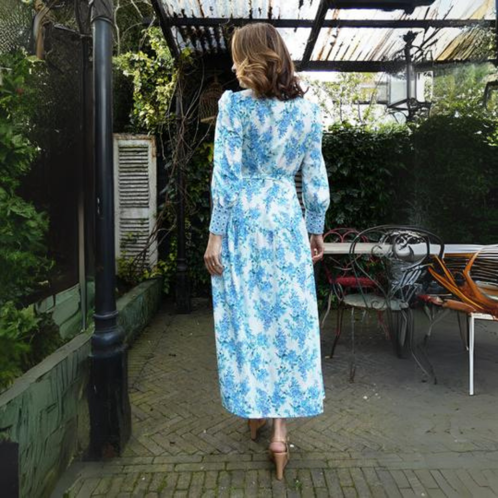 A beautiful maxi dress with contrast pattern border on the cuffs and neckline.