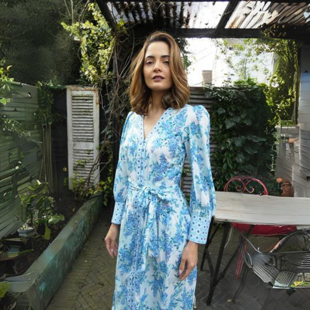 A beautiful maxi dress with contrast pattern border on the cuffs and neckline.