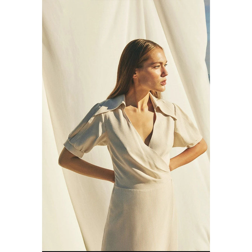 Explore the Agon Wrap Dress crafted for elegance. Online dress shop. Shop Now!