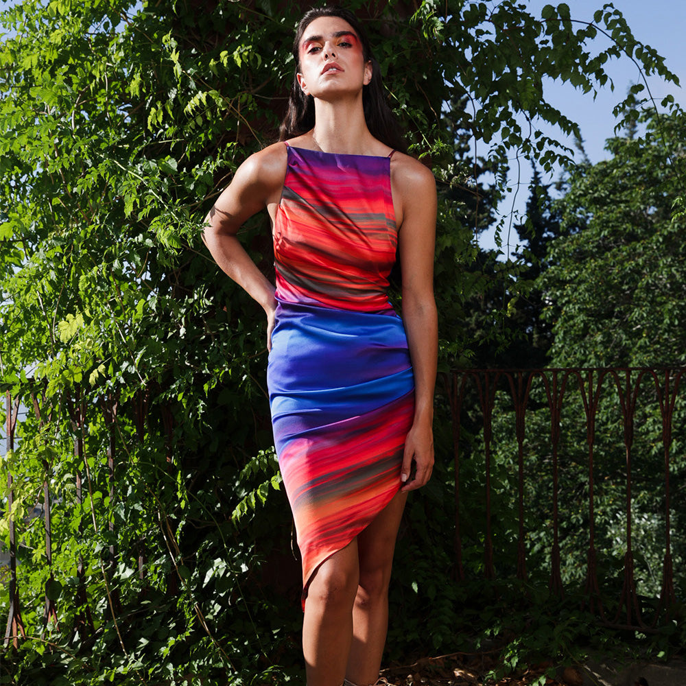 Straight cut, backless dress with side gatherings in double-sided silk. Asymmetric ankle length.