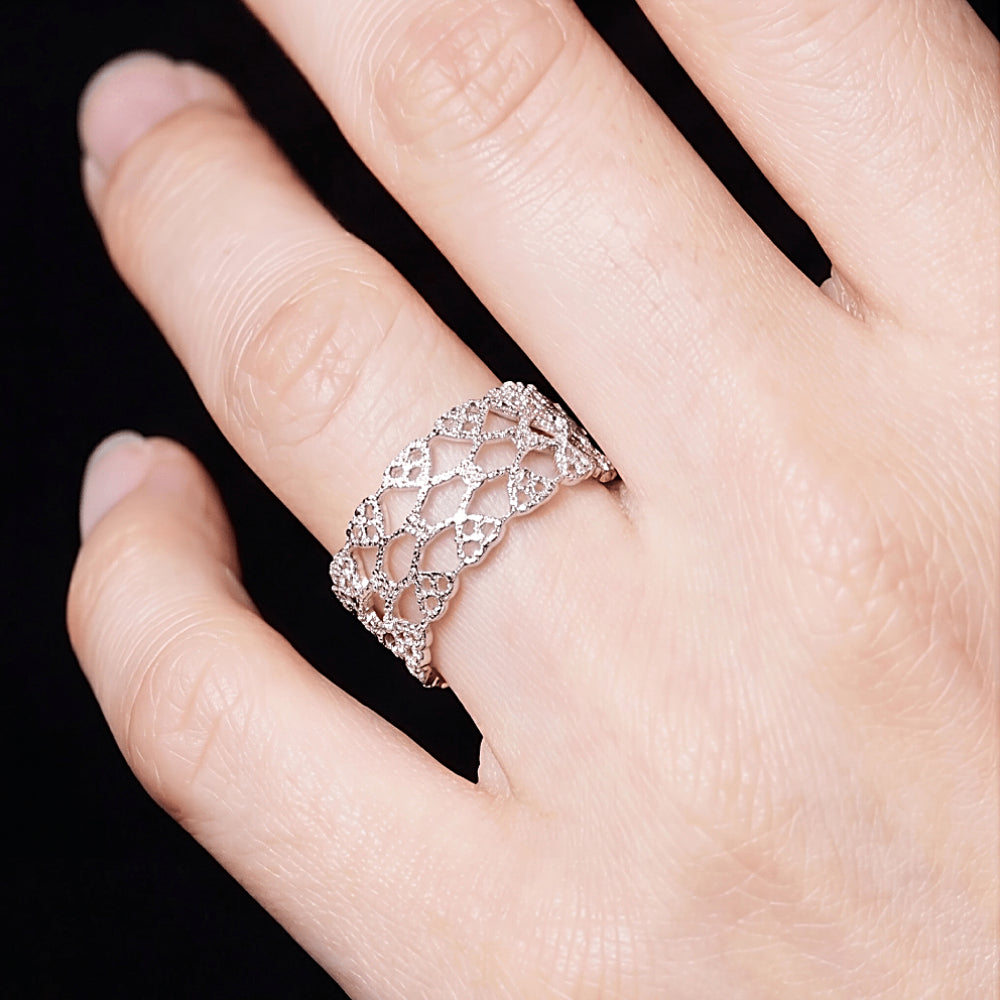 Discover the Alhambra Lace Sterling Silver Ring at The Luxe Maison, featuring intricate lace patterns and romantic heart-shaped motifs.