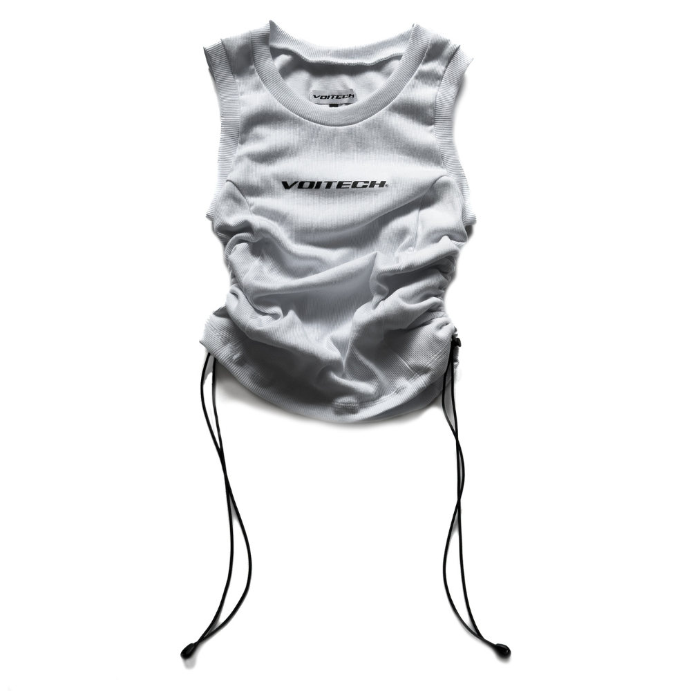 Shop online from our exclusive website and discover the Alpha Bungee Ribbed Vest by Voitech®, featuring ribbed stretch cotton, adjustable bungee detailing, and a bold technical streetwear design.
