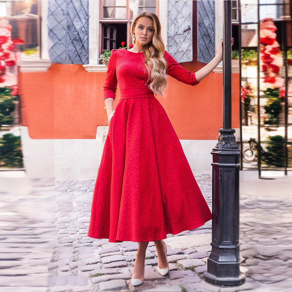 The long flowing skirt designed with pockets will move beautifully as you move through the room or twirl on the dance floor.