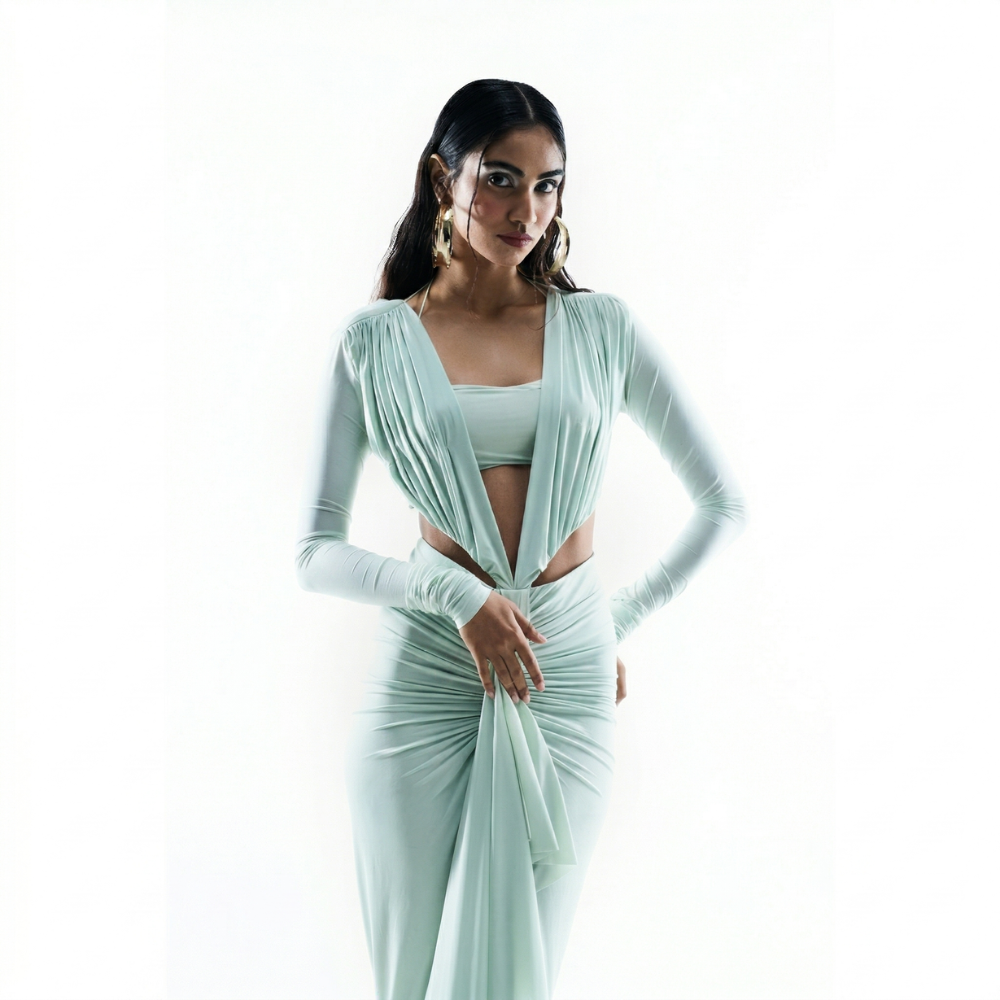 Sea green bustier dress with ruched bodice and pleated silhouette, perfect for parties and brunch. Shop online from our exclusive collection of premium designer styles.