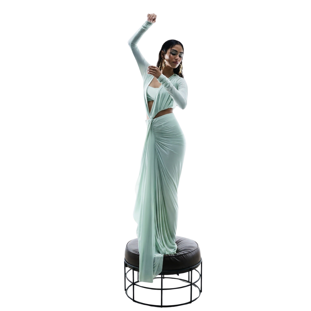 Sea green bustier dress with ruched bodice and pleated silhouette, perfect for parties and brunch. Shop online from our exclusive collection of premium designer styles.