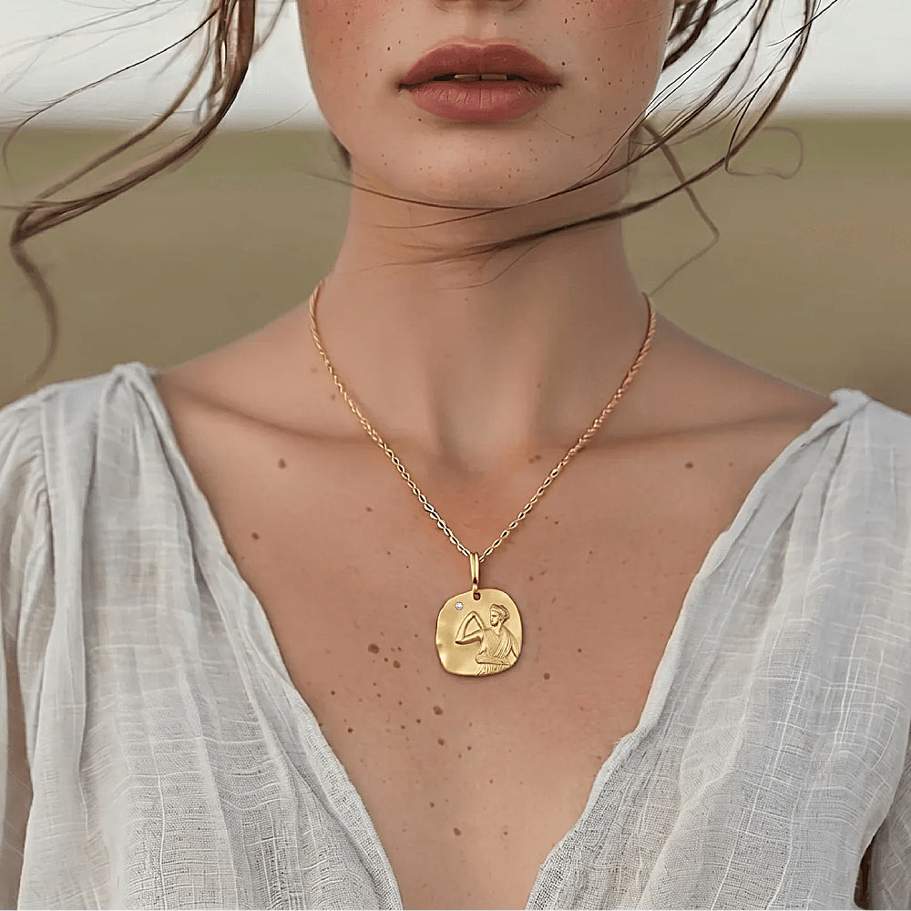 Discover the Artemis the Huntress Gold Vermeil Coin Necklace at The Luxe Maison, featuring a detailed Greek goddess pendant with a bow and star, symbolizing freedom, strength, and feminine power.