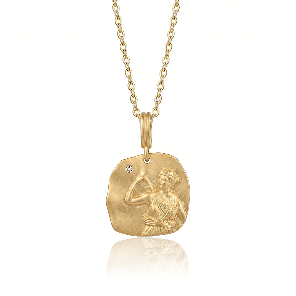 Discover the Artemis the Huntress Gold Vermeil Coin Necklace at The Luxe Maison, featuring a detailed Greek goddess pendant with a bow and star, symbolizing freedom, strength, and feminine power.