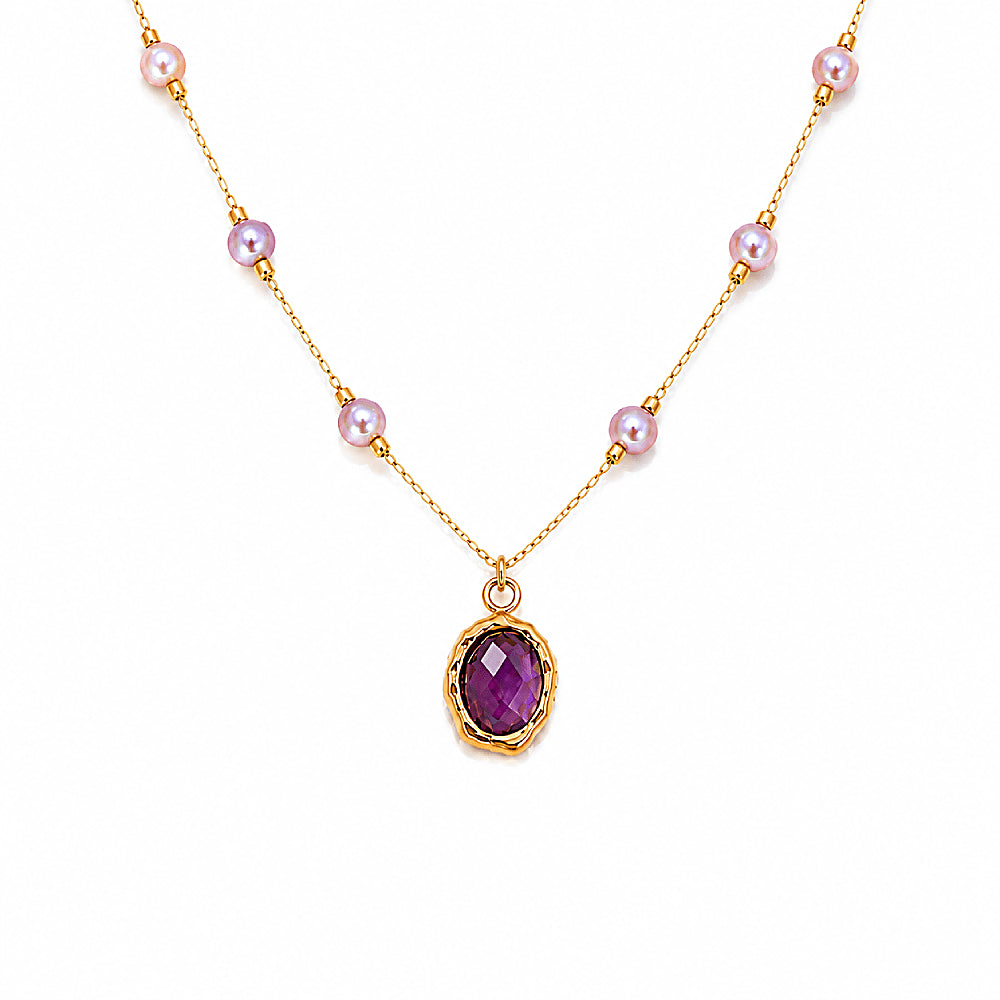 Discover the Asteria Amethyst & Pearl Necklace at The Luxe Maison, featuring iridescent pink and lilac pearls, a faceted amethyst pendant, and a delicate golden chain.
