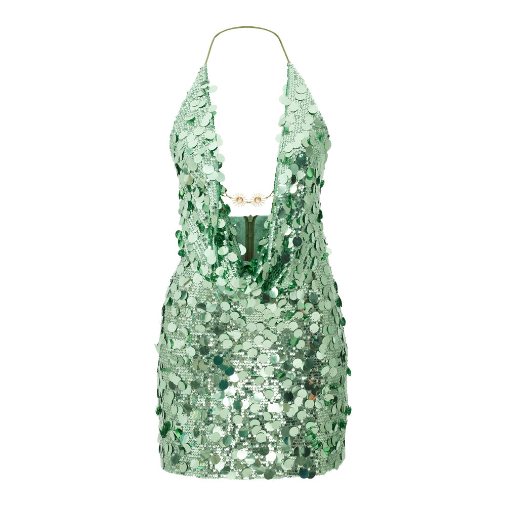 Shop online from our exclusive website and discover the Astra Dress by Nana Gotti, a sequined mini dress with a plunging cowl neckline, open back, and elegant custom-made design.