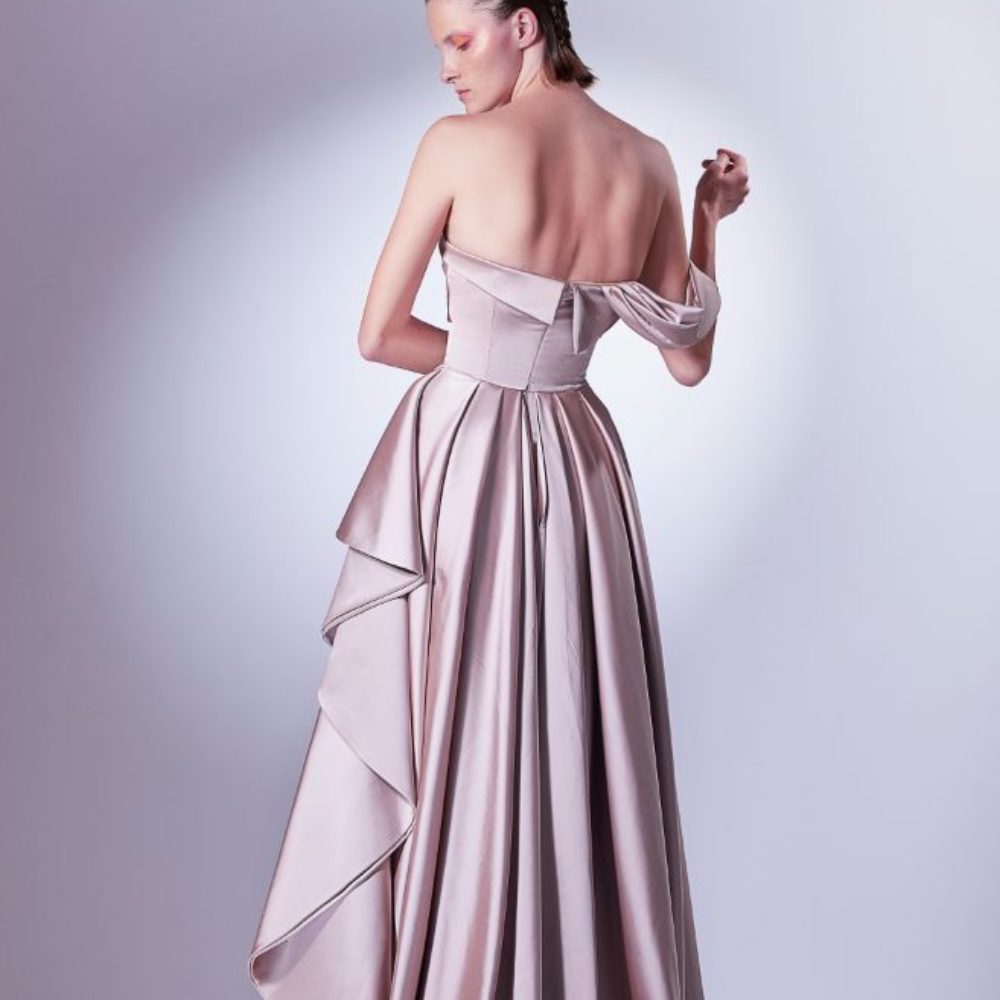 Asymmetric off the shoulder dress, designed in nude earthly colors. The bust is a marriage of satin and pleated tulle.
