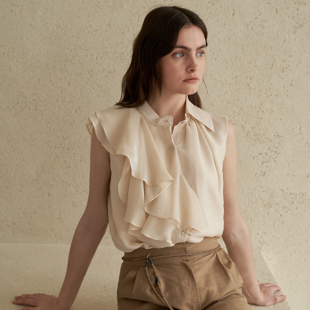 Embrace Grace with Sleeveless Silk Blouse in Champagne Pink