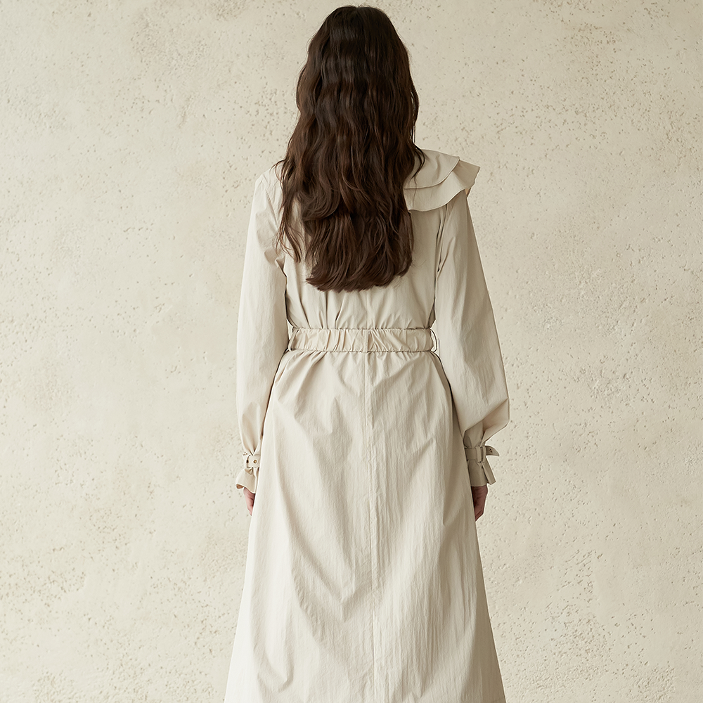 Discover the beauty of dresses with this trench coat designed for timeless charm. Shop Now!