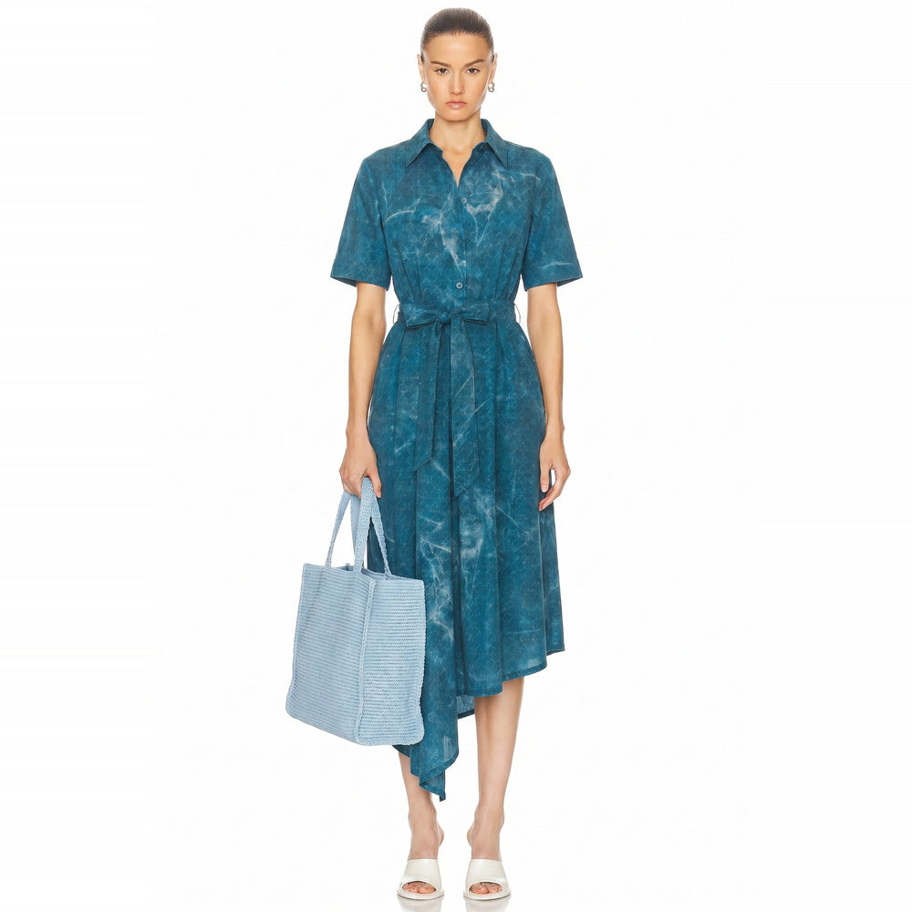 Shop online from our exclusive website and discover the Asymmetric Eucalyptus Silk Shirt Dress by Benedetti Life, crafted from sustainable eucalyptus silk for fluid elegance, comfort, and modern versatile style.