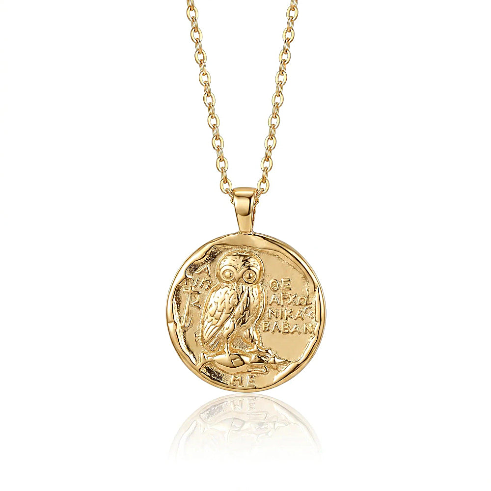 Discover the Athena's Owl Gold Vermeil Coin Necklace at The Luxe Maison, featuring an ancient Greek-inspired coin pendant with Athena's sacred owl, symbolizing wisdom, knowledge, and inner strength.