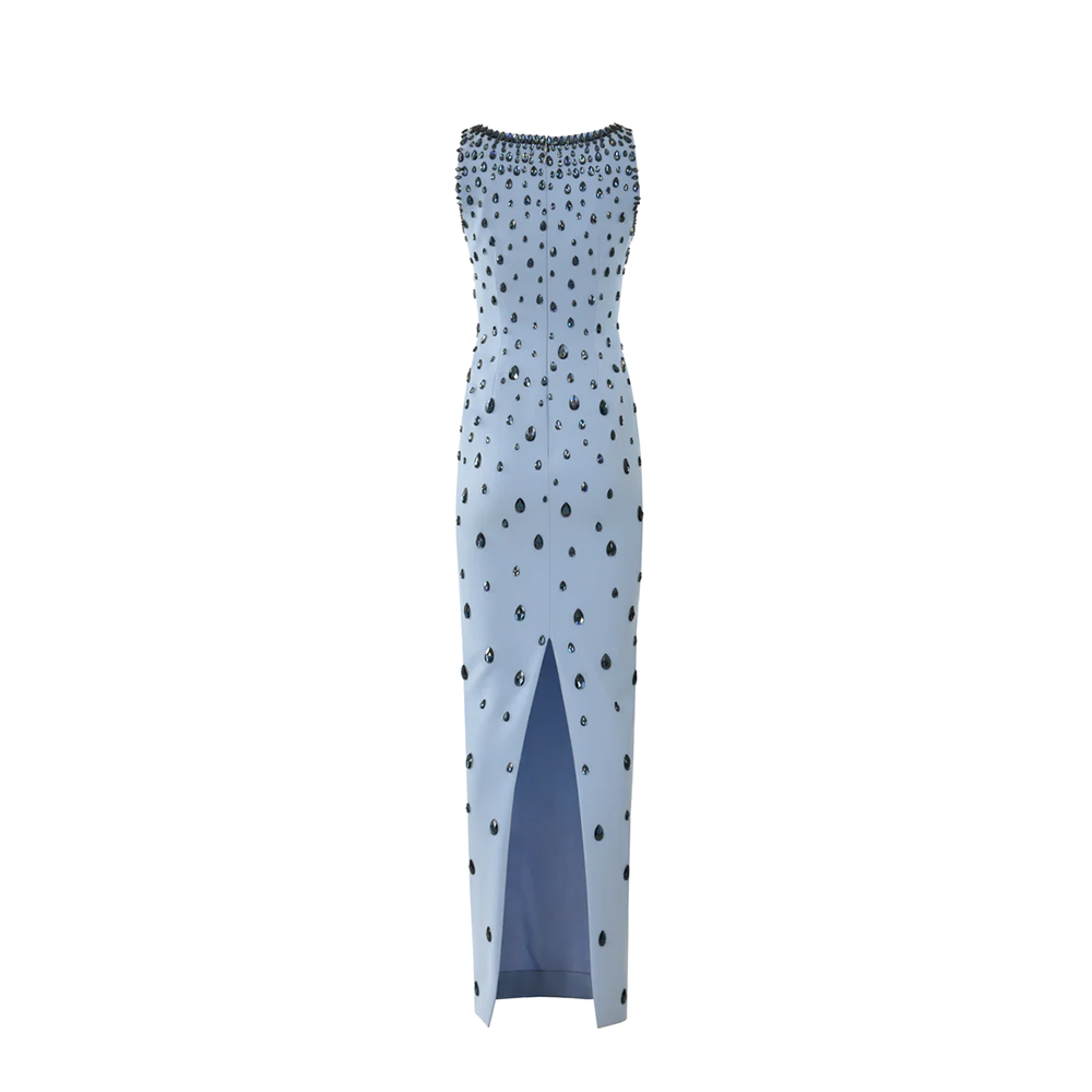 A sky blue column dress fully embroidered with midnight blue pear shaped crystals.