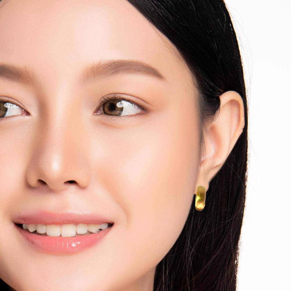 Shop online premium 18K gold dangler earrings with sparkling cubic zirconia stones.