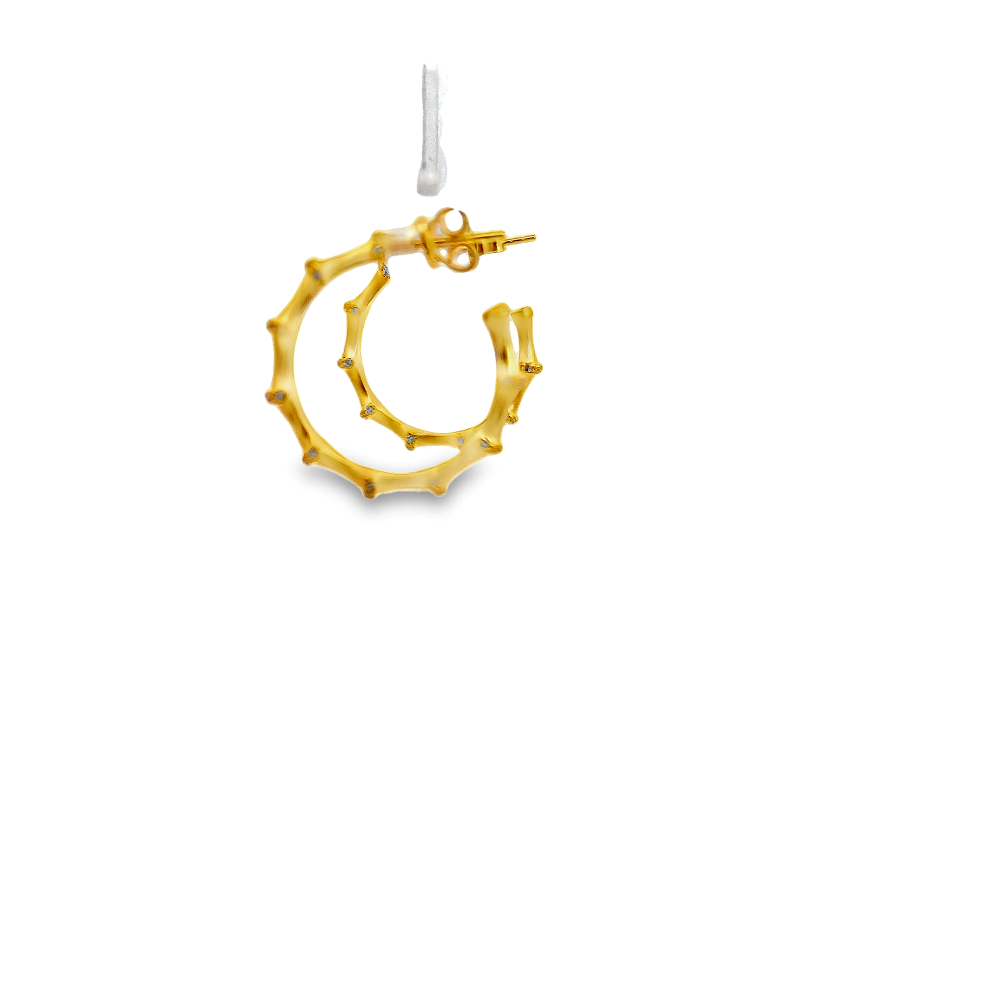 Shop online premium 18K gold bamboo hoop earrings with sparkling cubic zirconia stones.