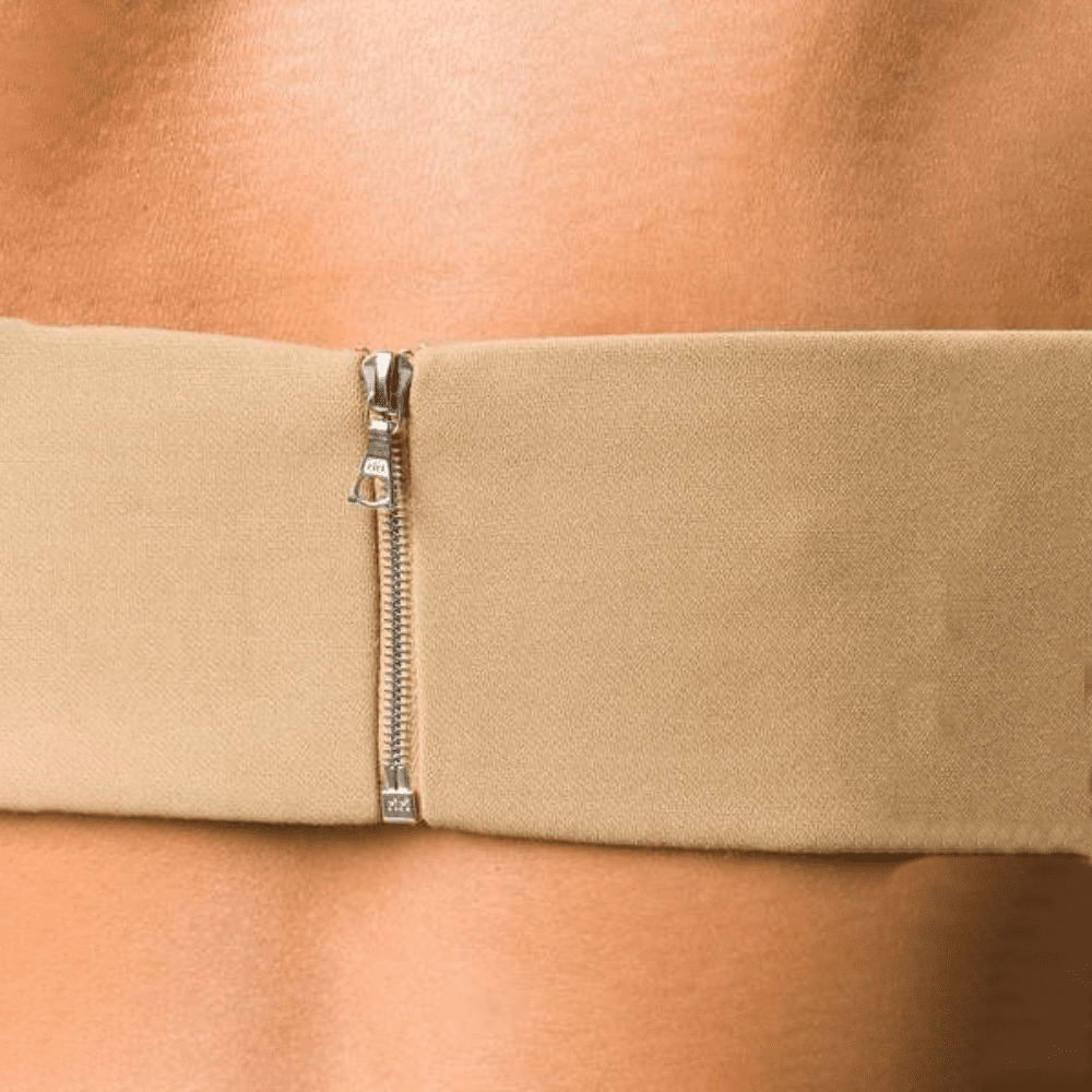 David Koma zipper bandeau top in beige. The ultra body contouring silhouette. 