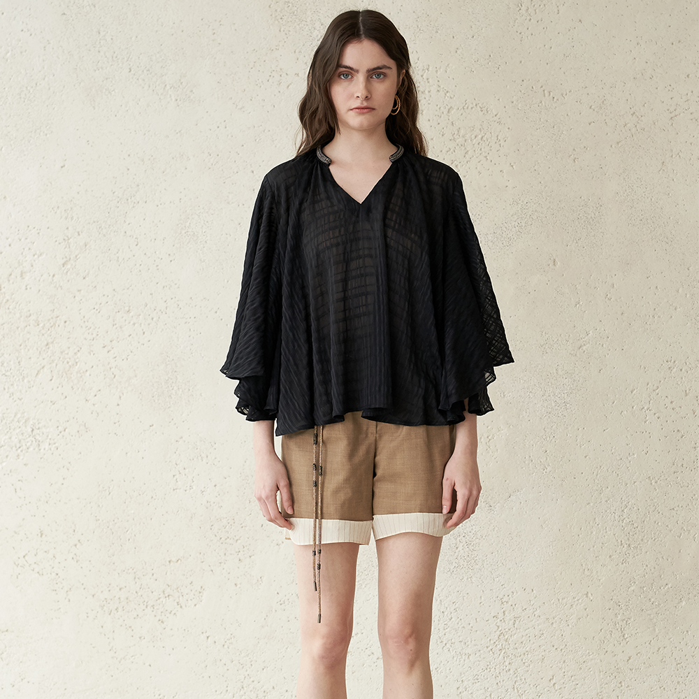 Find elegant bead-embellished cape sleeve blouses at luxury shops online. Shop Now!