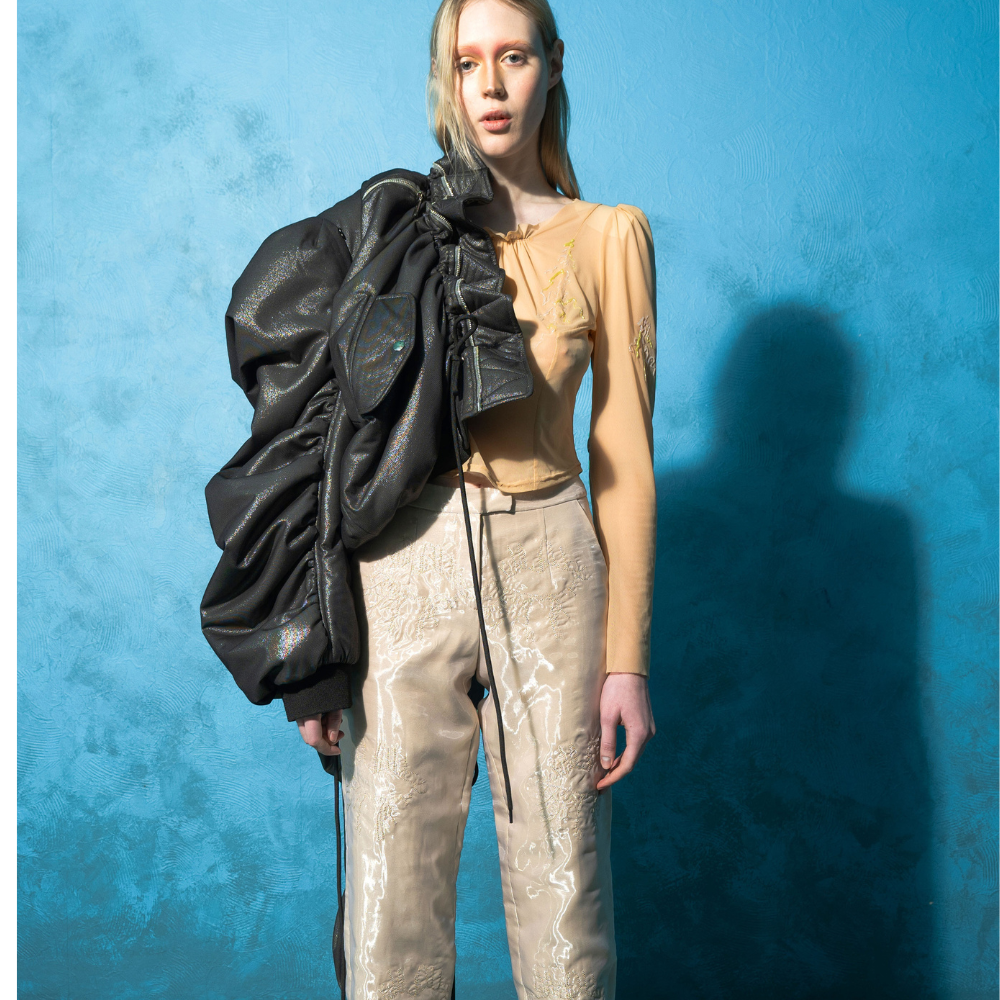 Beige organza pants with quilted lips from our clothing store. Shop Now!