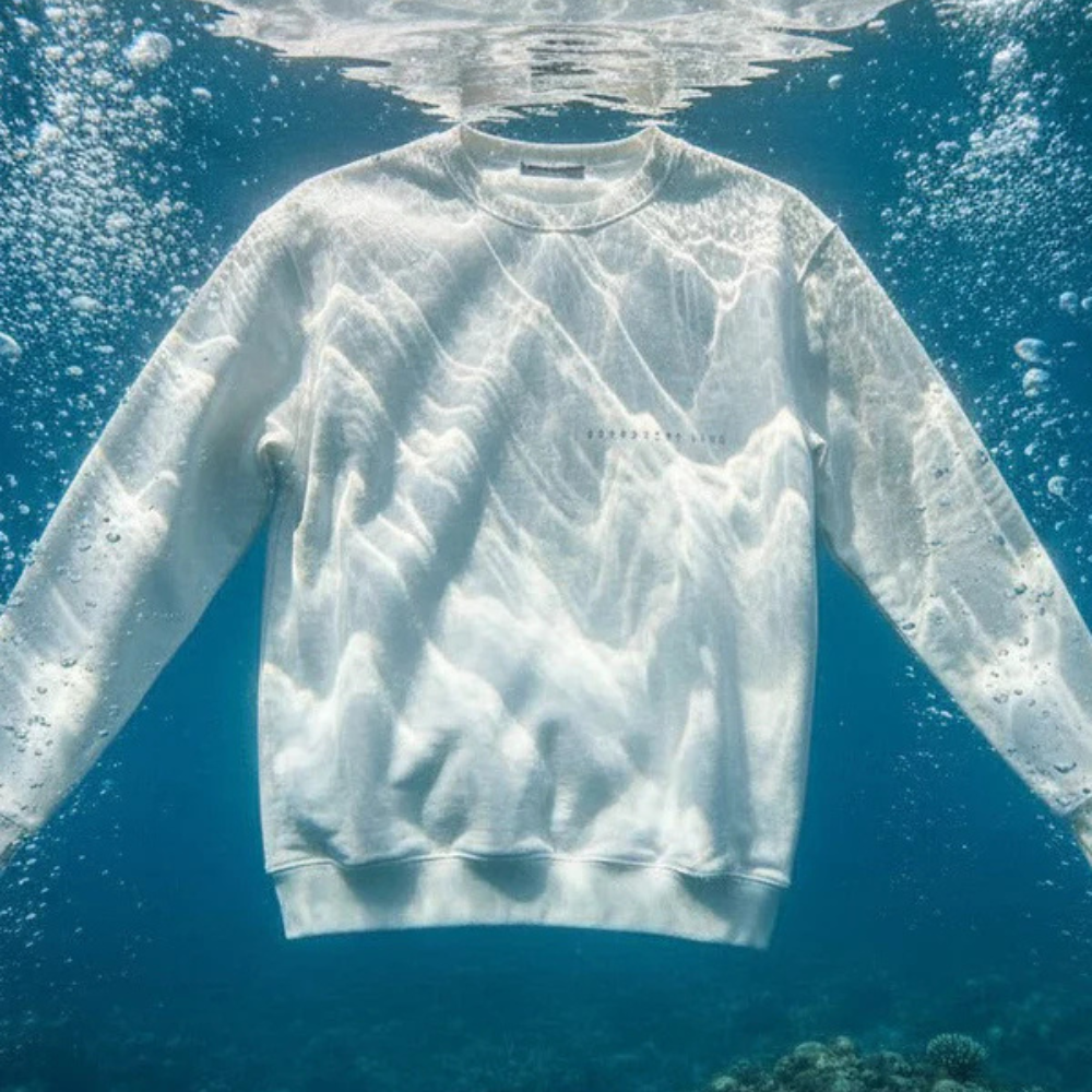Shop online from our exclusive website and discover the Benedetti Life Organic Cotton Sweatshirt, crafted from 100% organic cotton fleece with signature ocean-inspired print for sustainable everyday comfort and style.