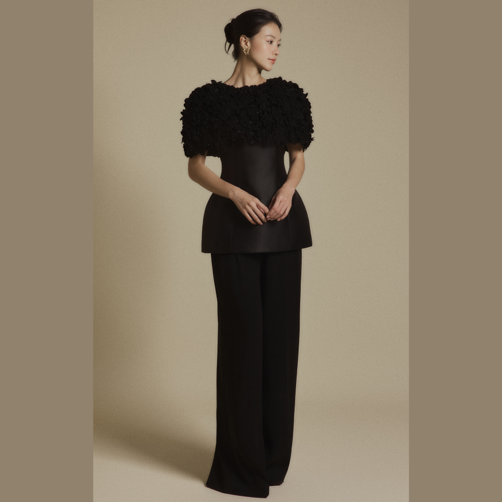 Discover chic luxury designer dresses paired perfectly with the Black Bloom 3D Floral Cape. Shop Now!