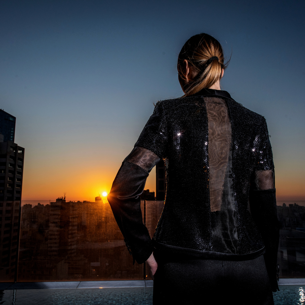 Black crepe Blazer in black sequins and black short pants.