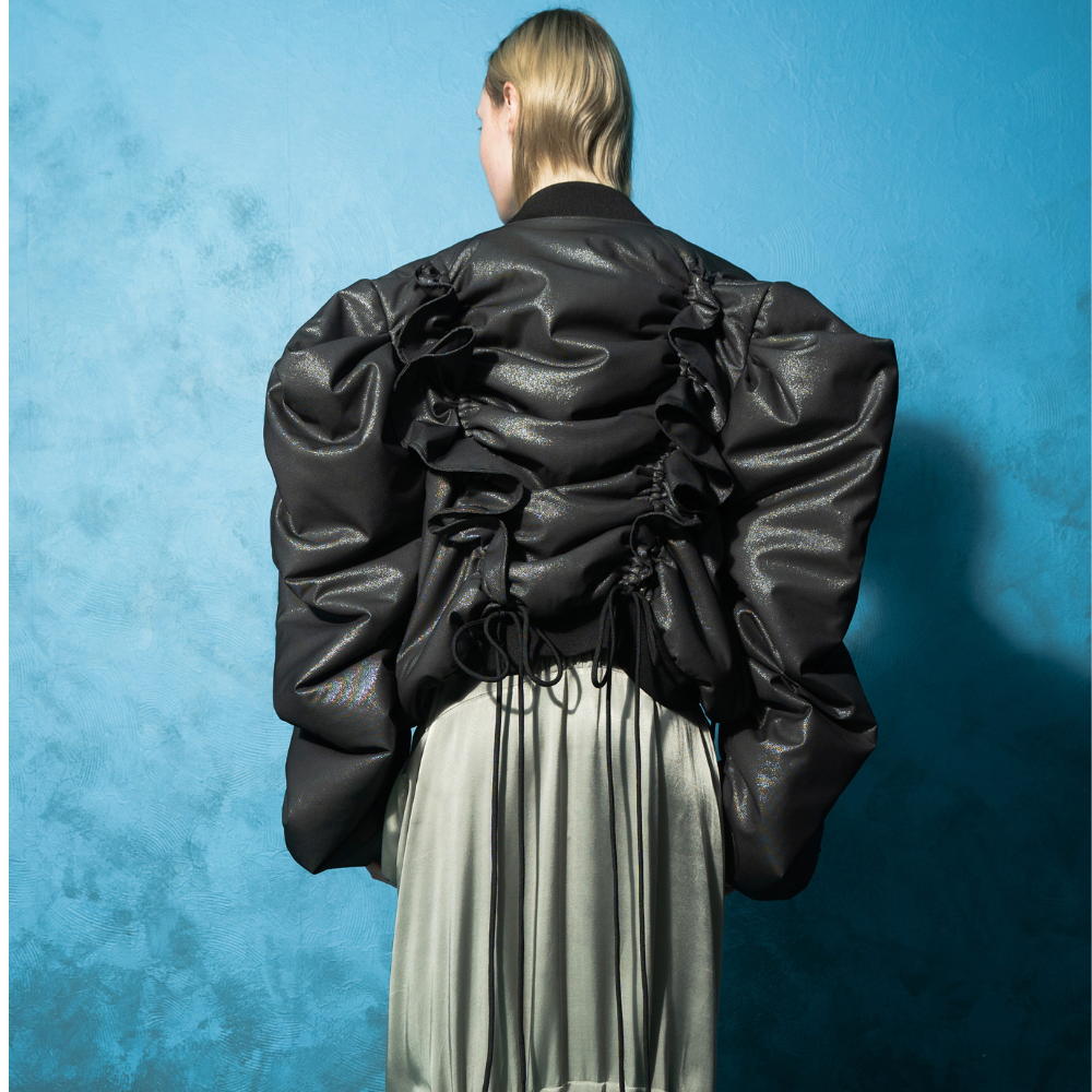 Discover the Black Shimmer Fairy Bomber at our women store. Shop Now!