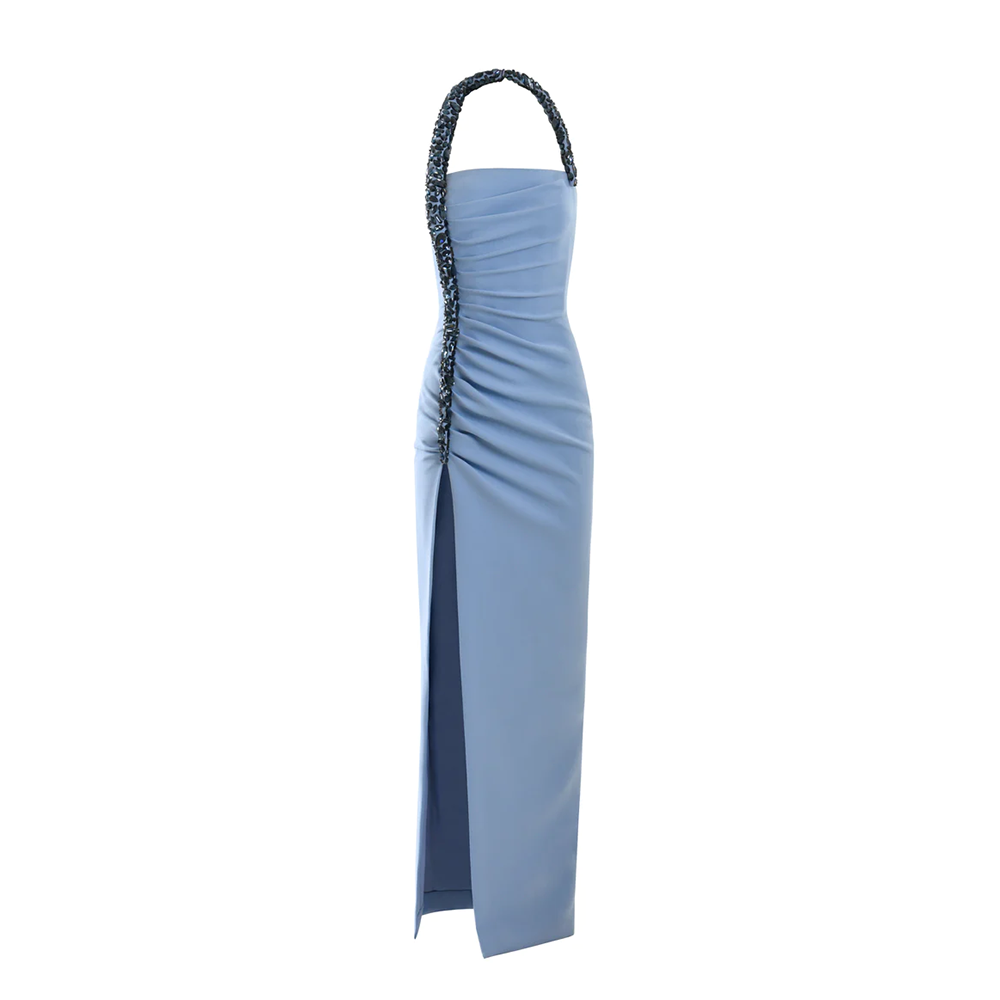 A sky blue crepe dress fastened with an embossed cord embroidered with midnight blue crystals.