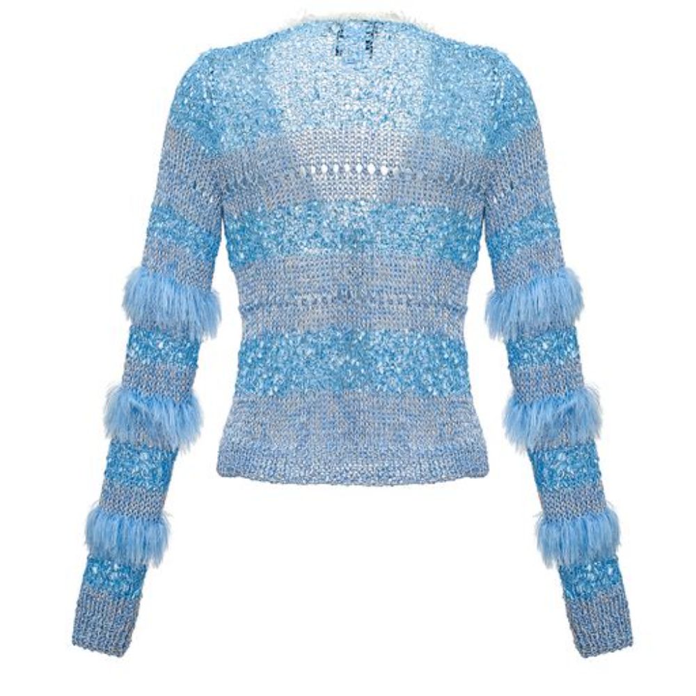 The Blue handmade sweater with long sleeves has wavy knit ruffles and looks like a piece of art. 