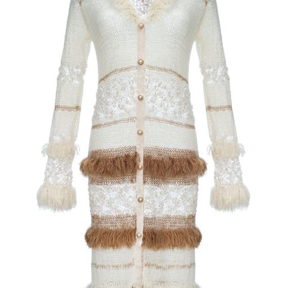 Brown Sundown Handmade Knit Cardigan-Dress With Pearl Buttons is spun from a soft silk blend.