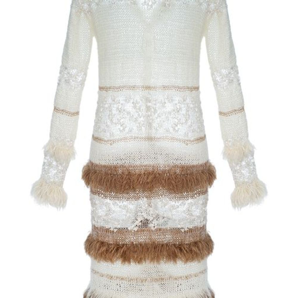 Brown Sundown Handmade Knit Cardigan-Dress With Pearl Buttons is spun from a soft silk blend.