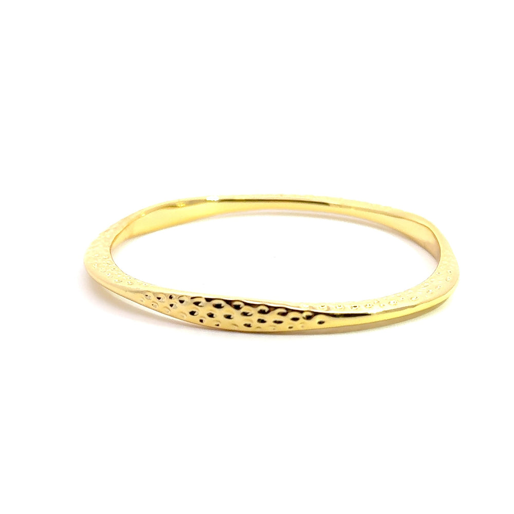 Handmade 22K yellow gold plated hammered bangle with a sleek narrow design. Perfect for stacking or solo styling. Shop premium jewelry online.