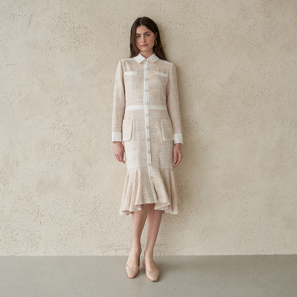 Explore the website to shop for dresses like this elegant tweed mermaid dress. Shop Now!