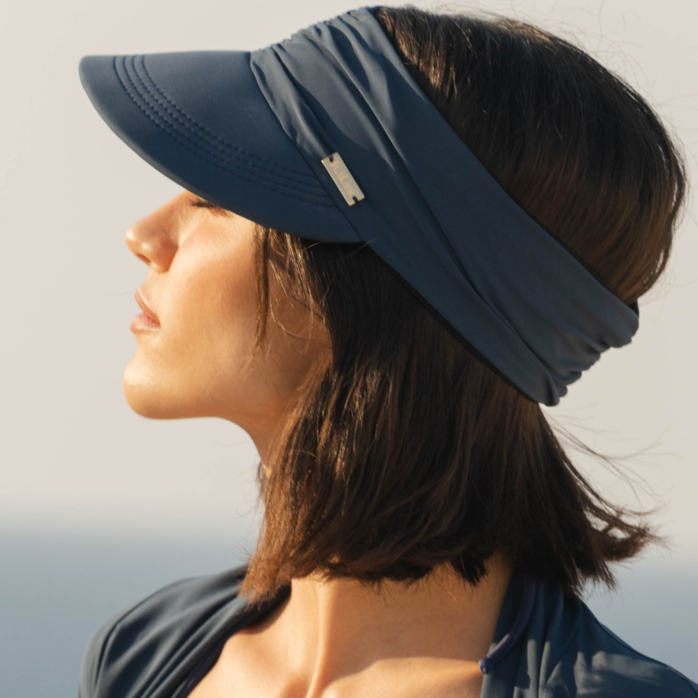 Capri Reversible UV Visor is a lightweight breathable reversible sun visor cap. Shop Now!