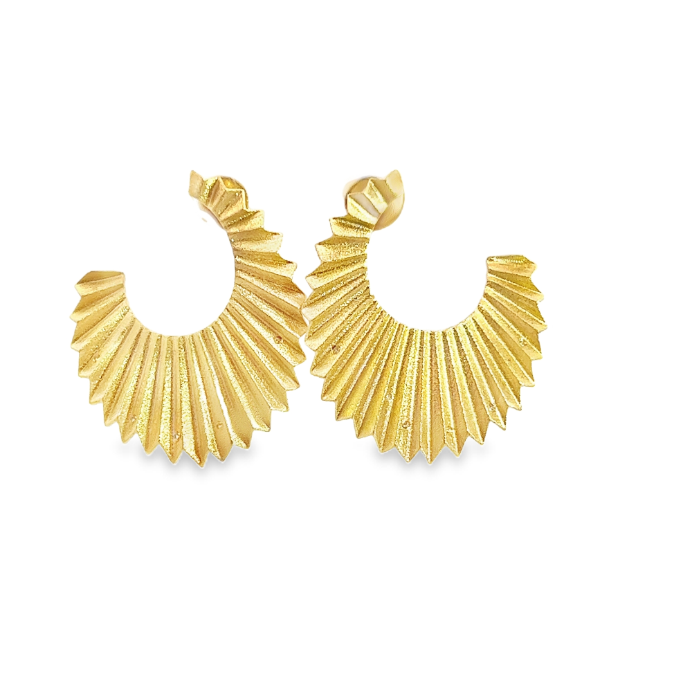 Shop online premium 18K gold statement earrings with wave design and sparkling cubic zirconia.
