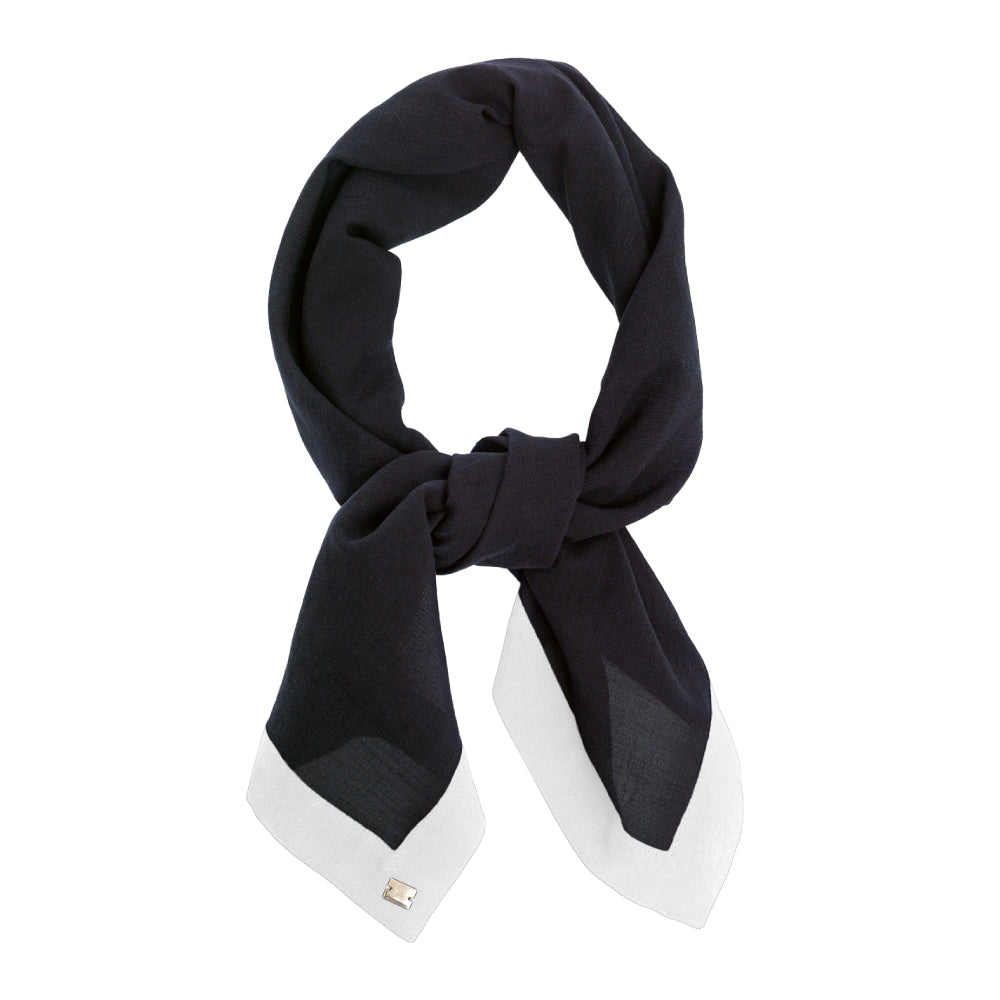 Discover the Carré Colourblock at The Luxe Maison, featuring lightweight cotton batiste and contrasting piping. Wear it as a headscarf or neck scarf.