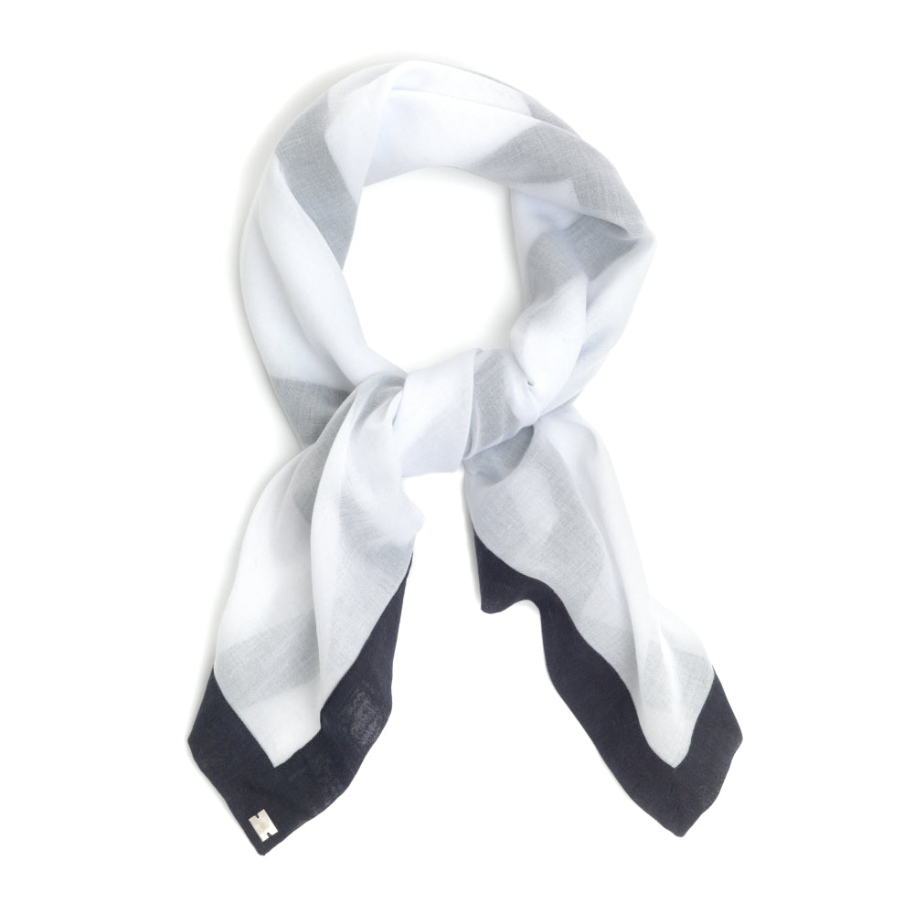 Discover the Carré Colourblock at The Luxe Maison, featuring lightweight cotton batiste and contrasting piping. Wear it as a headscarf or neck scarf.