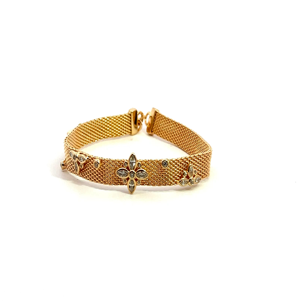 Sterling silver 18k gold-dipped watch-style net bracelet with a detailed center design and sparkling cubic zirconia accents. Shop premium jewelry online.