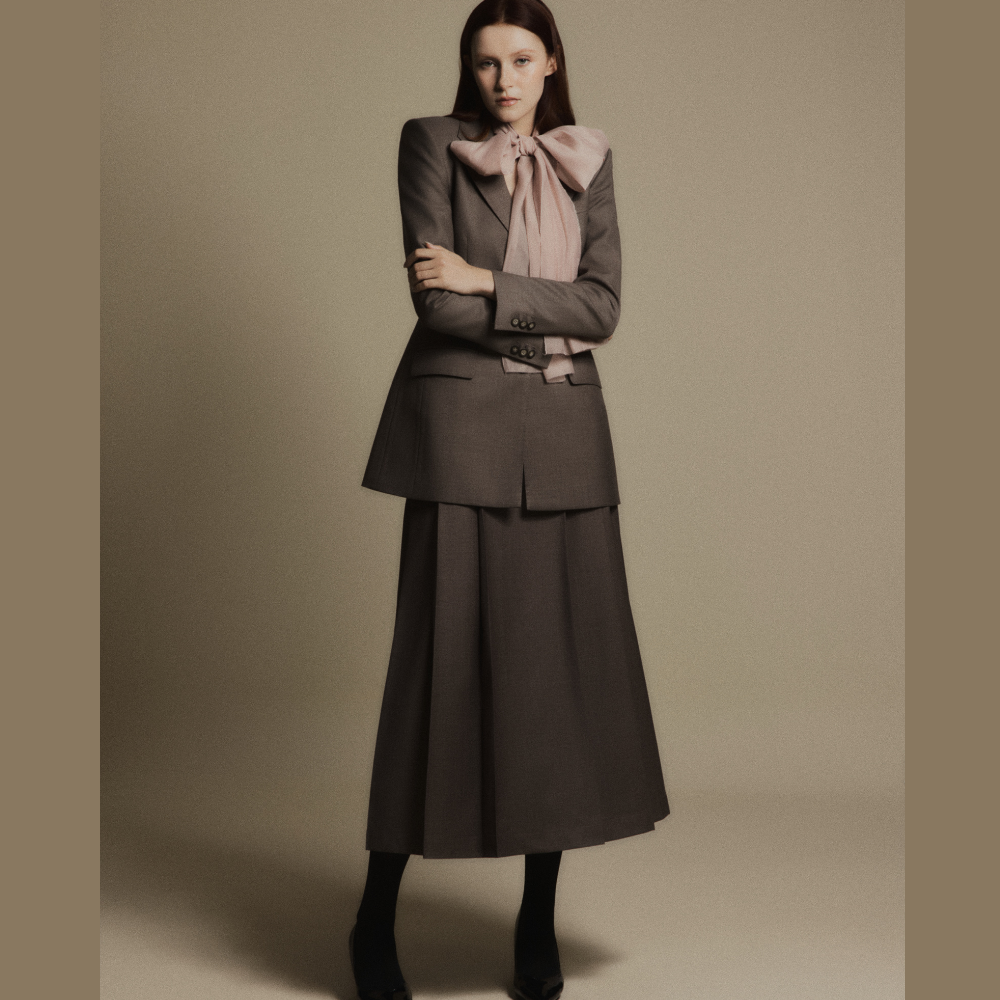 Explore online boutiques to find the timeless Charcoal Stone Classic Wool Blazer for every wardrobe. Shop Now!