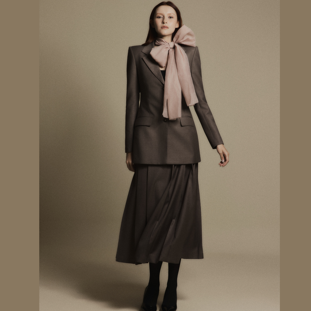 Explore online boutiques to find the timeless Charcoal Stone Classic Wool Blazer for every wardrobe. Shop Now!