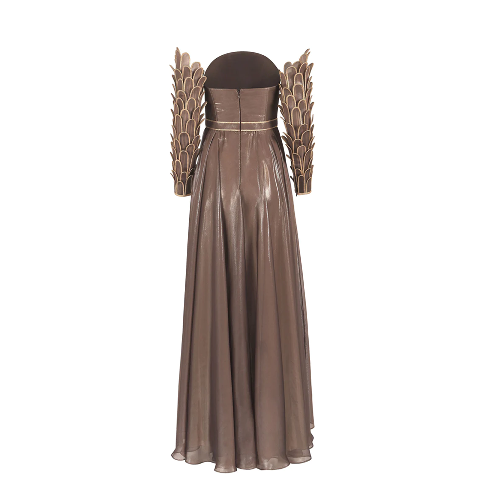 A corseted bronze chiffon dress with armor sleeves in three dimensional hand-crafted plumes.