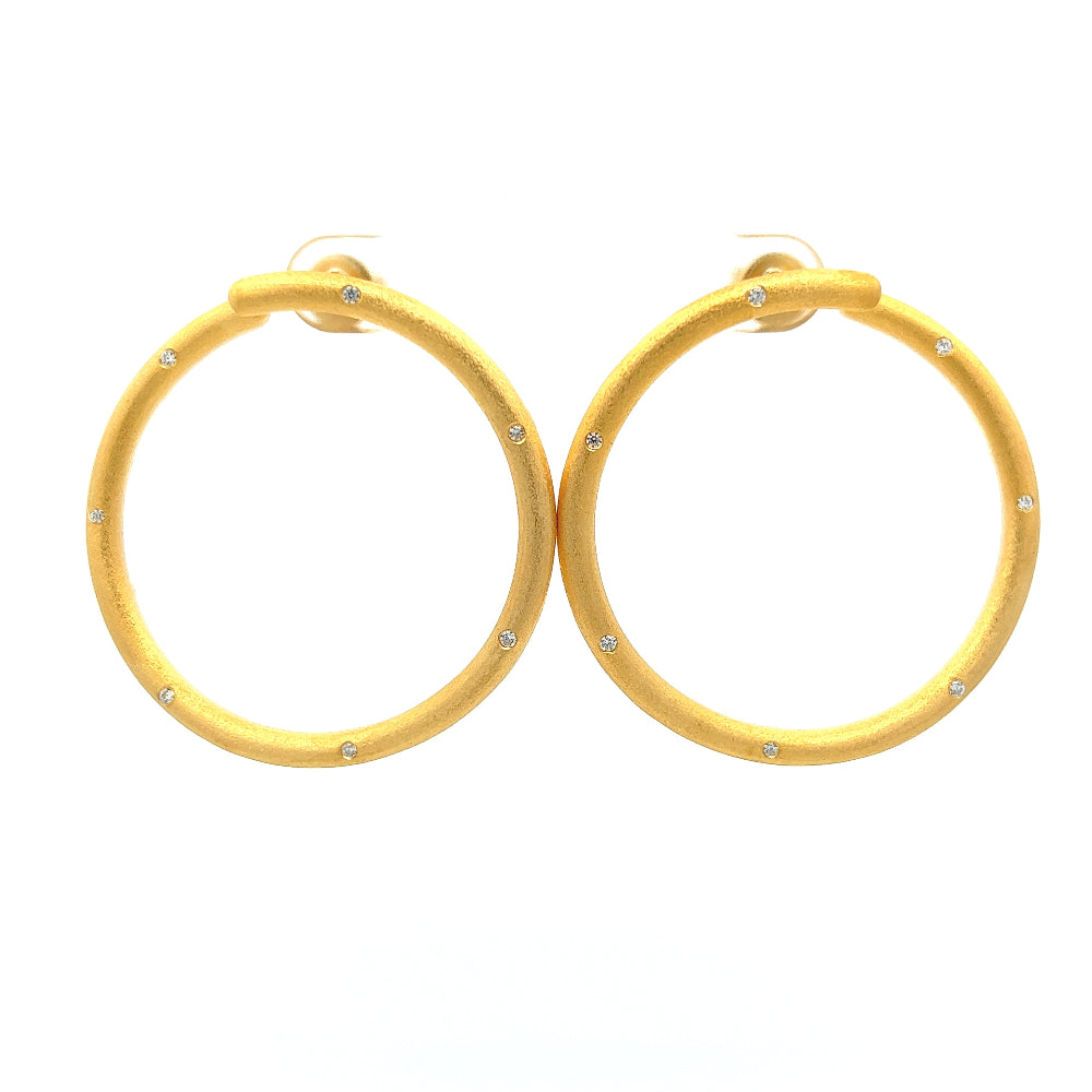 Shop online premium 18K gold-dipped hoop earrings with sparkling cubic zirconia stones.