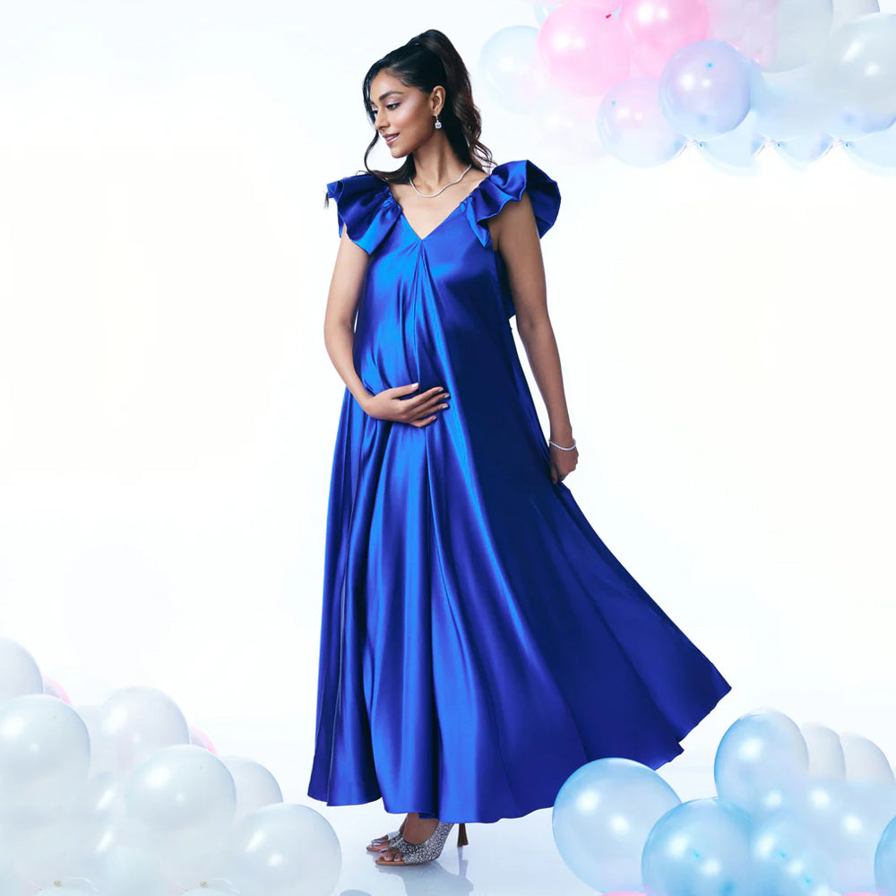 Maternity satin dress with ruffled sleeves and fluid fit, perfect for events. Shop online from our curated edit of premium fashion.