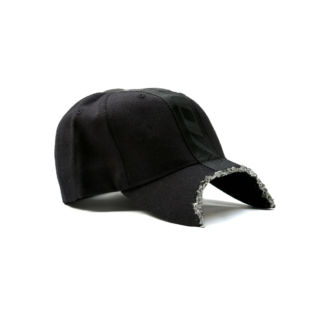 Shop online from our exclusive website and discover the Composite Molten Alloy Cap by Voitech®, featuring heavyweight cotton drill, a hand-applied molten alloy visor, and industrial-inspired technical craftsmanship.