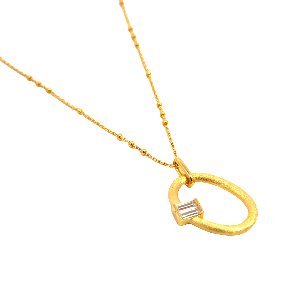 Shop online premium 18K gold-dipped sterling silver oval pendant necklace with CZ detailing.