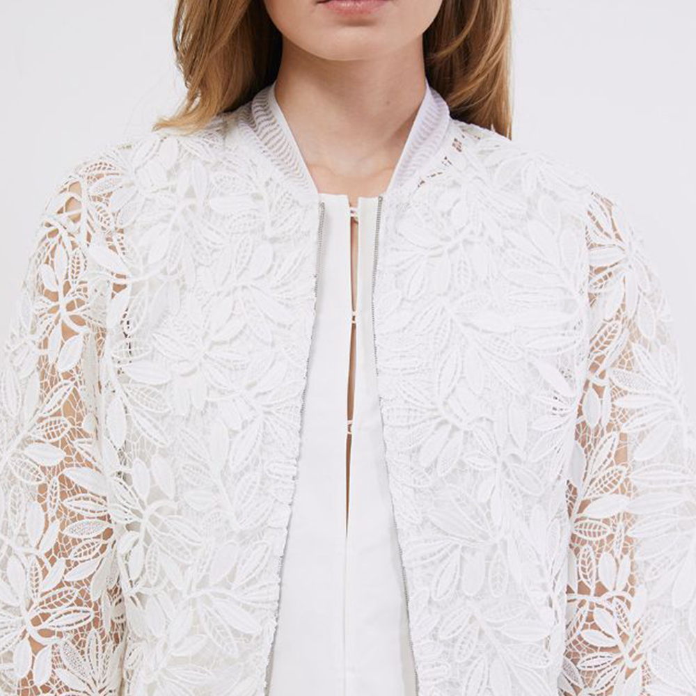 Raw-edged, Round neckline One side handkerchief-hem with patch pocket Adjustable tie belt at waist Relaxed silhouette.