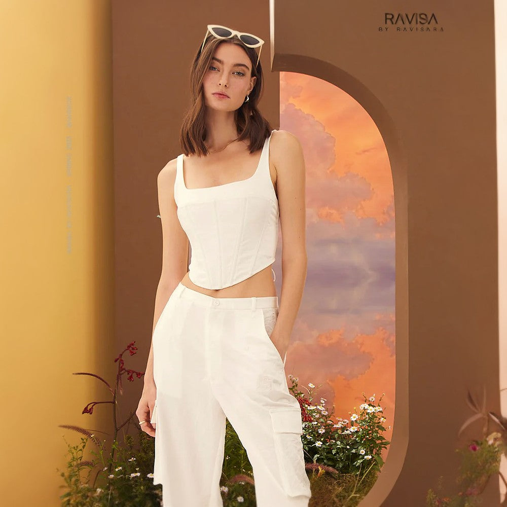 This "crushed" corset tank provides a refreshing twist to the iconic style.