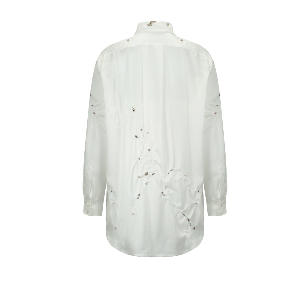 Beautiful dresses for women in Couture White Wrinkled Shirt. Shop Now!