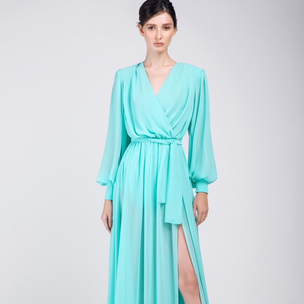 This gown is floor length, pastel green color, long puff sleeves party wear.